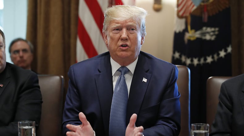 President Donald Trump speaks during a Cabinet meeting in the Cabinet Room of the White House, Tuesday, July 16, 2019, in Washington.
