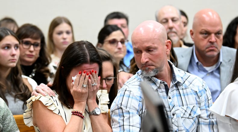 Allyson Phillips (left), mother of Laken Riley, reacts as John Phillips, stepfather of Laken Riley, comforts her during a trial of Jose Ibarra at Athens-Clarke County Superior Court, Friday, November 15, 2024, in Athens. Jose Ibarra was charged in the February killing of Laken Hope Riley, whose body was found on the University of Georgia campus. (Hyosub Shin / AJC)