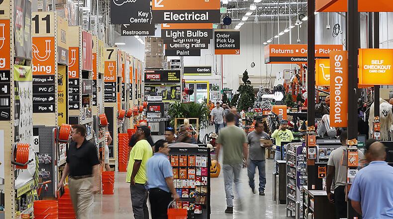 Customers pass through the "racetrack", the busiest aisle that is by the registers. Home Depot is leading a charge of retailers looking for legislative help in dealing with organized retail crime. The thieves use all sorts of methods and in most cases, they know they will not be physically stopped. They make off with hundreds and sometimes thousands of dollars worth of goods. Bob Andres / robert.andres@ajc.com