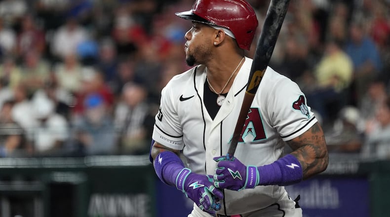 Arizona Diamondbacks designated hitter Ketel Marte waits to bat against the Philadelphia Phillies during the first inning of a baseball game, Monday, Aug. 31, 2026, in Phoenix. (AP Photo/Ross D. Franklin)