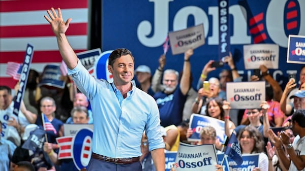 U.S. Sen. Jon Ossoff waves to the crowd at a rally last month in Savannah. (Sarah Peacock for the AJC)