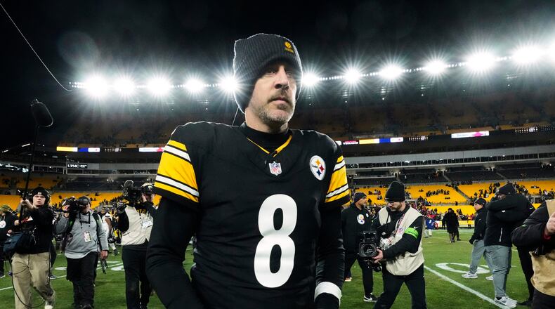 FILE - Pittsburgh Steelers quarterback Aaron Rodgers (8) leaves the field after an NFL wild-card playoff football game against the Houston Texans, Monday, Jan. 12, 2026, in Pittsburgh. (AP Photo/Gene J. Puskar,File)