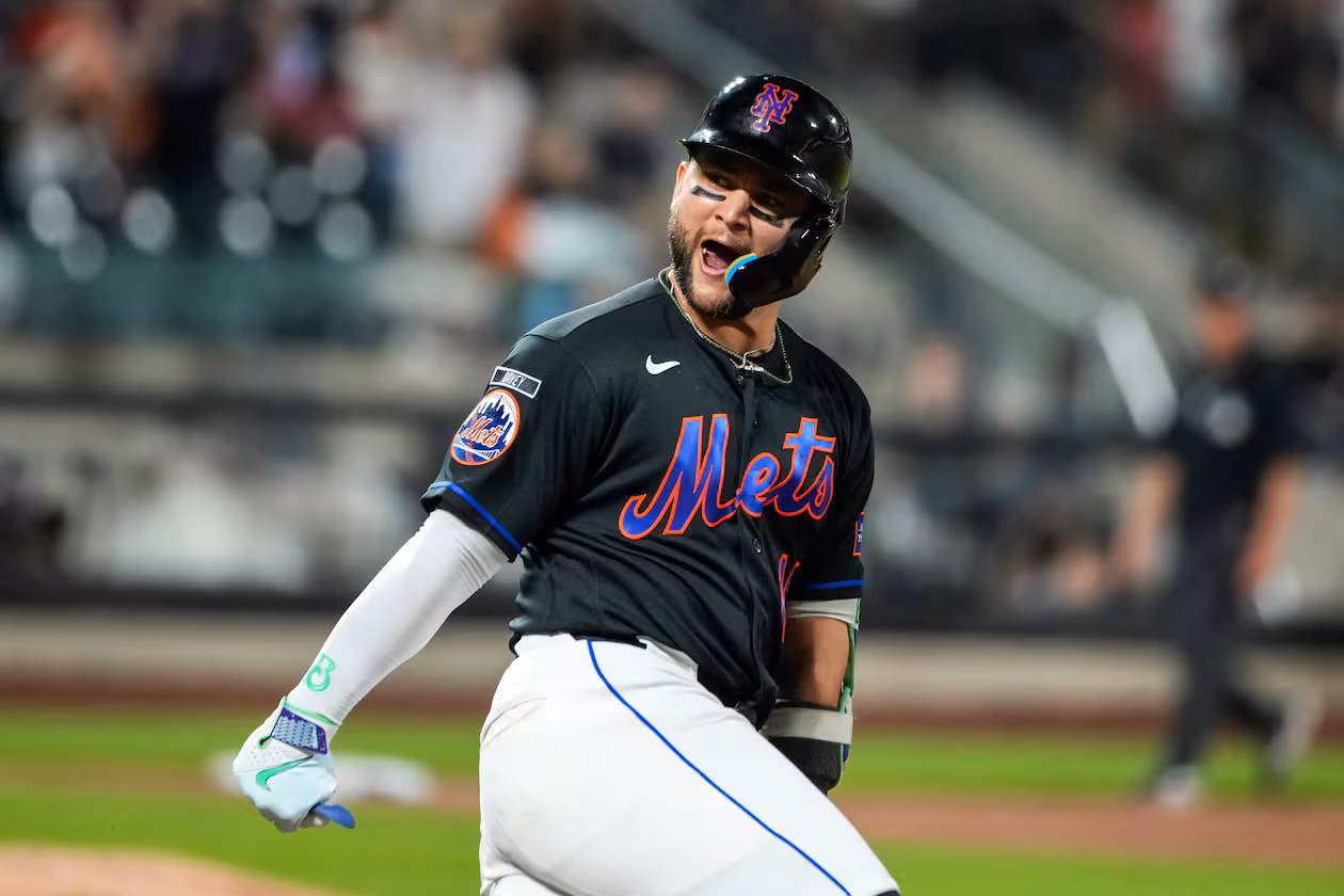 New York Mets' Bo Bichette (19) celebrates a solo home run during the second inning of a baseball game against the Atlanta Braves, Friday, June 12, 2026, in New York. (AP Photo/Eduardo Munoz Alvarez)
