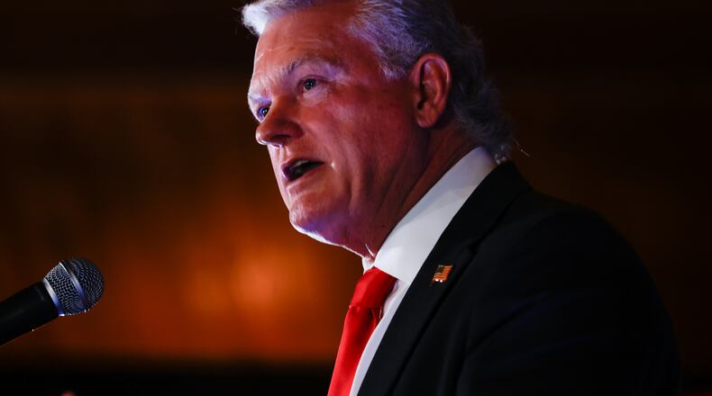 U.S. Rep. Mike Collins, R-Ga., speaks at his primary election watch party in Jackson, Ga. on Tuesday, May 19, 2026. (Arvin Temkar/Atlanta Journal-Constitution via AP)