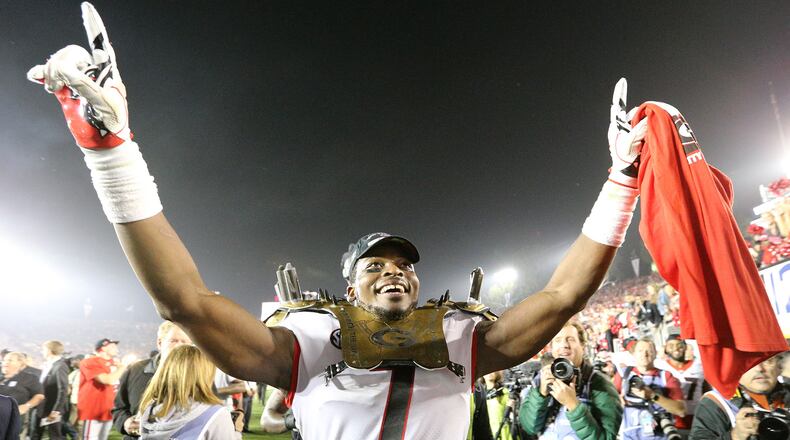 Georgia linebacker Lorenzo Carter celebrates beating Oklahoma 54-48 during double over time in the College Football Playoff Semifinal at the Rose Bowl Game on Monday, January 1, 2018, in Pasadena. Curtis Compton/ccompton@ajc.com