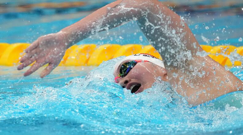 Li Bingjie of China competes in the women's 400-meter freestyle final in swimming at the Asian Games in Tokyo, Sept. 22, 2026. (AP Photo/Hiro Komae)