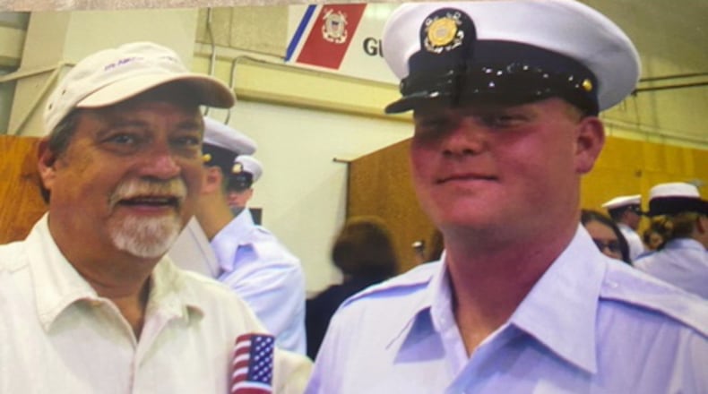 In this undated photo, Gregory McMichael is seen with his son Travis McMichael, when Travis was in the Coast Guard. (Handout)