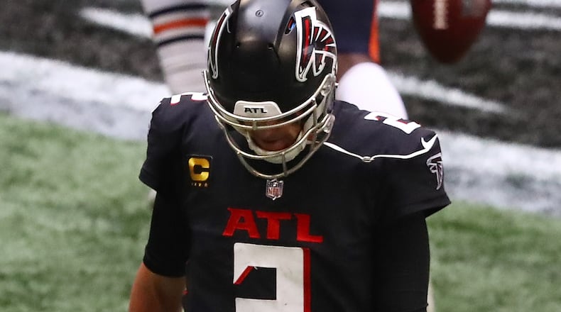 092720 Atlanta: Atlanta Falcons quarterback Matt Ryan walks off the field after throwing an interception to Chicago Bears Tashaun Gipson during the final minutes of the fourth quarter Sunday, Sept. 27, 2020, in Atlanta. (Curtis Compton / Curtis.Compton@ajc.com)