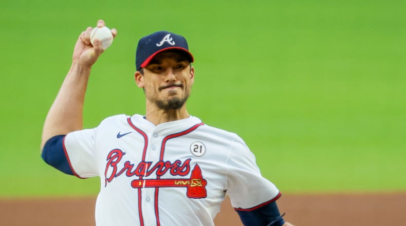 Braves starting pitcher Charlie Morton (50) prepares to pitch to the Los Angeles Dodgers batter in the first inning at Truist Park on Sunday, Sept. 15, 2024, in Atlanta.
(Miguel Martinez/ AJC)