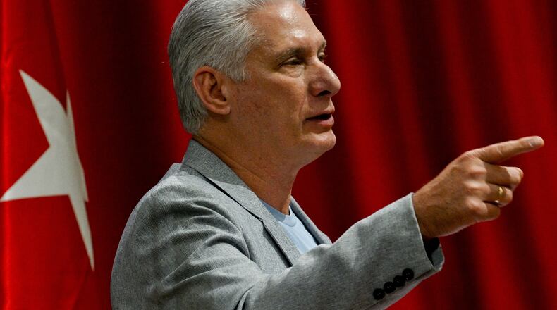 Cuban President Miguel Diaz-Canel delivers a welcome speech to participants of the "Nuestra America," or Our America Convoy at the Convention Palace in Havana, Cuba, Friday, March 20, 2026.(Adalberto Roque/Pool Photo via AP)