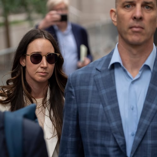 FILE - Charlie Javice, center, exits Manhattan federal court, Monday, Sept. 29, 2025, in New York. (AP Photo/Yuki Iwamura, File)
