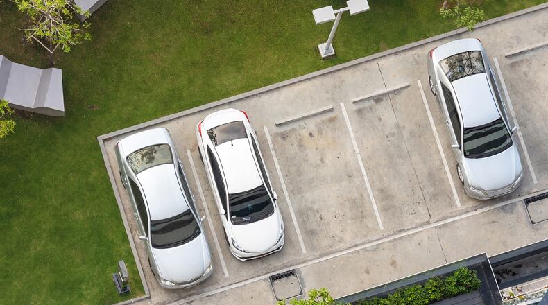 Whether bundled into rent or purchase price, parking is costly. (Dreamstime/TNS)