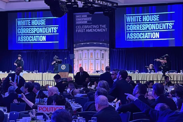 Members of the U.S. Secret Service counter assault team stand on the stage after a shooting incident outside the ballroom during the White House Correspondents Dinner on Saturday. (Alex Brandon/AP)