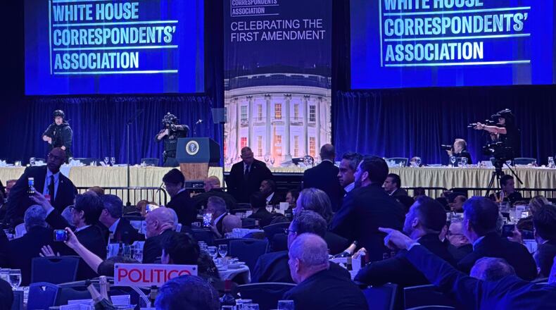 Members of the U.S. Secret Service counter assault team stand on the stage after a shooting incident outside the ballroom during the White House Correspondents Dinner, Saturday, April 25, 2026, in Washington. (AP Photo/Alex Brandon)