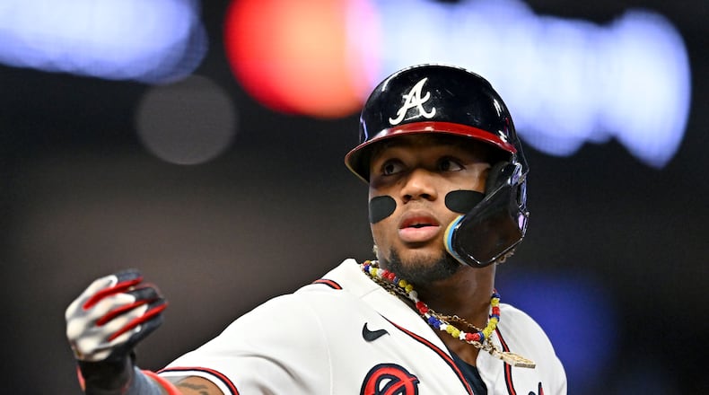 Atlanta Braves' right fielder Ronald Acuna Jr. celebrates after hitting a home run on September 26, 2023, in Atlanta. (Hyosub Shin / Hyosub.Shin@ajc.com)