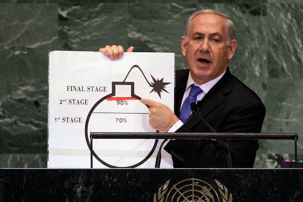 FILE - Israeli Prime Minister Benjamin Netanyahu shows an illustration as he describes his concerns over Iran's nuclear ambitions during his address to the 67th session of the United Nations General Assembly at U.N. headquarters, Sept. 27, 2012. (AP Photo/Richard Drew, File)