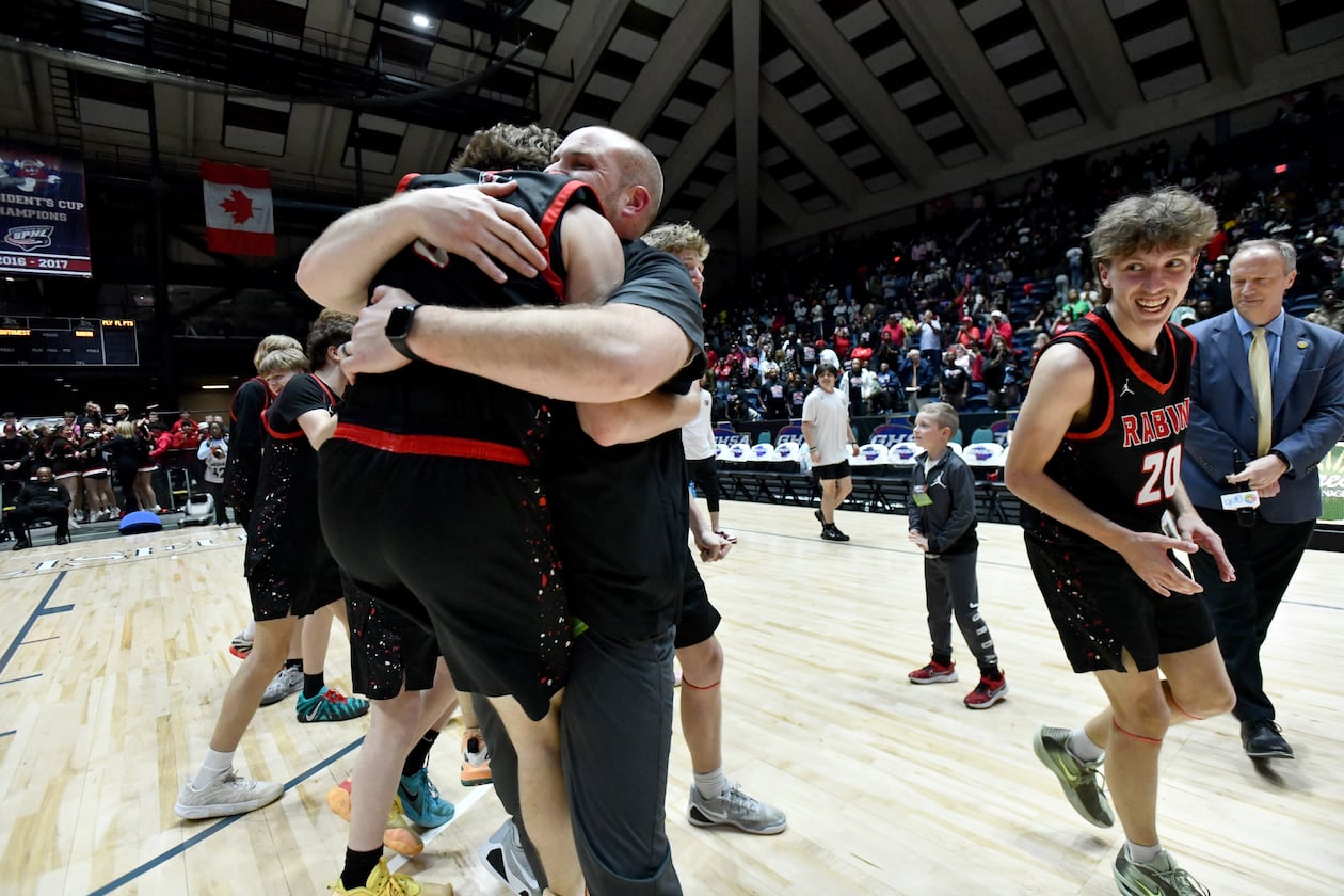 Rabun County players and coaching staff celebrate their win over Southwest during Class A Division I Boys GHSA State Championship at the Macon Coliseum, Friday, March 13, 2026, in Macon. Rabun County won 52-43 over Southwest. (Hyosub Shin/AJC)