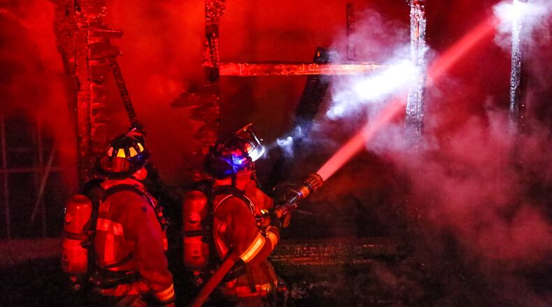 Authorities were on the scene of a fatal house fire in the 1400 block of Andrews Street on Mon., March 7, 2016. JOHN SPINK / JSPINK@AJC.COM