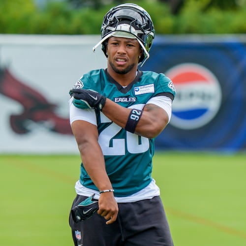 Philadelphia Eagles running back Saquon Barkley (26) looks on during practice at the team's NFL football training camp in Philadelphia, Thursday, July 30, 2026. (AP Photo/Chris Szagola)