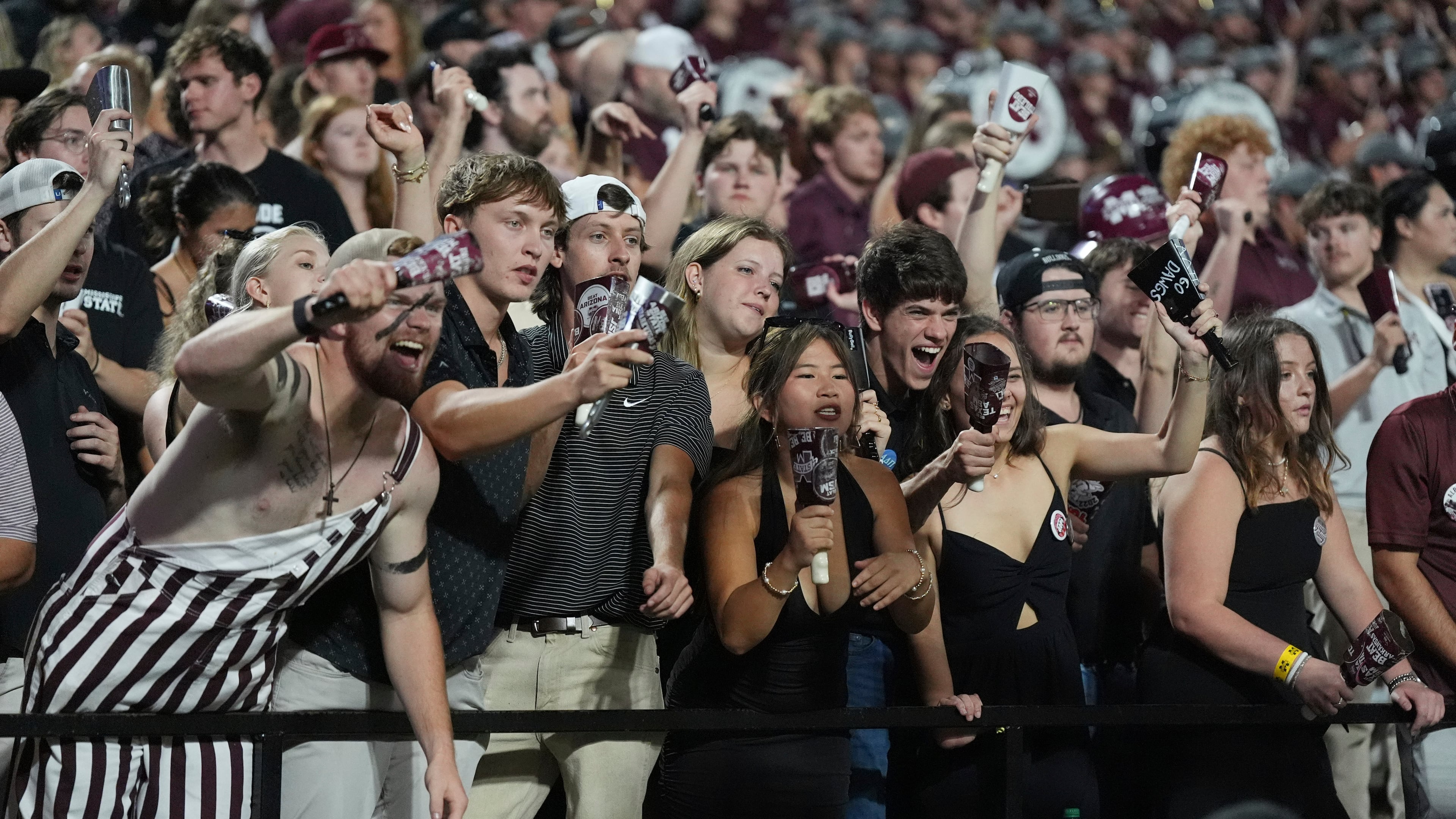 The cowbells were out in full force Saturday, as Mississippi State fans celebrated the Bulldogs' win over then-No. 12 Arizona State in Starkville, Miss. (Rogelio V. Solis/AP)