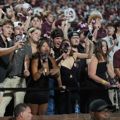 The cowbells were out in full force Saturday, as Mississippi State fans celebrated the Bulldogs' win over then-No. 12 Arizona State in Starkville, Miss. (Rogelio V. Solis/AP)
