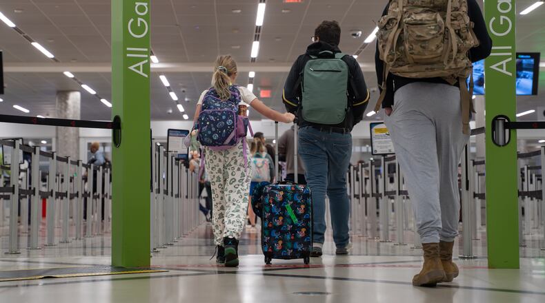 The CDC announced Saturday it has expanded enhanced public health entry screening for Ebola to Hartsfield-Jackson Atlanta International Airport, pictured in April. Enhanced screening had previously been announced for airports in Houston and Washington, D.C. (Ben Hendren for the AJC)