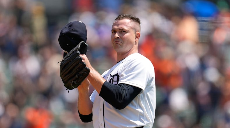Detroit Tigers pitcher Tarik Skubal tips his hat after his 1,000th career strikeout during the first inning of a baseball game against the Baltimore Orioles Wednesday, July 29, 2026, in Detroit. (AP Photo/Paul Sancya)