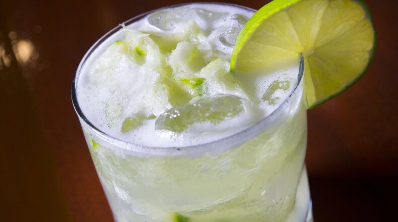 Edson Ludwig makes a caipirinha cocktail at Porto do Sul, a Brazilian restaurant in Overland Park. (Tammy Ljungblad/Kansas City Star/TNS)