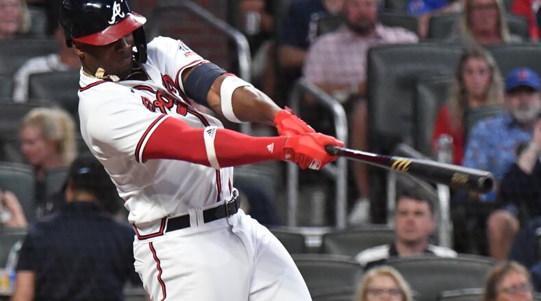 September 30, 2021 Atlanta - Atlanta Braves right fielder Jorge Soler (12) hits a solo home run in the first inning at Truist Park on Thursday, September 30, 2021. (Hyosub Shin / Hyosub.Shin@ajc.com)