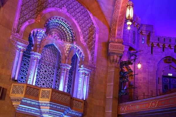 Looking like windows and a balcony opening onto an Arabian courtyard, this grate-covered opening contains two of the pipe chambers for the Fox’s Möller organ. Photo: Tyson Horne / tyson.horne@ajc.com