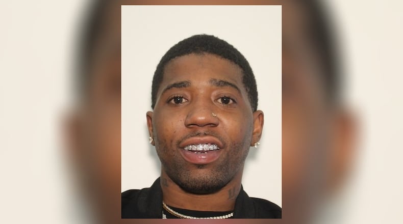 Atlanta rapper YFN Lucci, whose real name is Rayshawn Bennett, is wanted on murder and other charges following a fatal shootout last month in southwest Atlanta, authorities said.