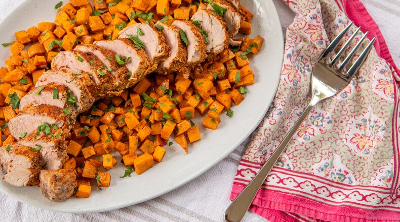 Sheet Pan Pork and Sweet Potatoes. (Aaliyah Man for The Atlanta Journal-Constitution)