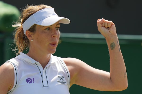 Russia's Anastasia Pavlyuchenkova reacts after beating Naomi Osaka of Japan during a third round women's singles match at the Wimbledon Tennis Championships in London, Friday, July 4, 2025.(AP Photo/Alastair Grant)