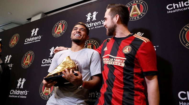 Photos from the press conference as Atlanta United forward Josef Martinez receives his Golden Boot trophy, given to the top MLS scorer each year, at the Atlanta United Training Facility in Marietta, Ga., on Thursday, Nov. 1, 2018. Atlanta Braves outfielder Ender Inciarte, a personal friend of Martinez, made a special guest appearance to give his friend the award. (Casey Sykes for The Atlanta Journal-Constitution)