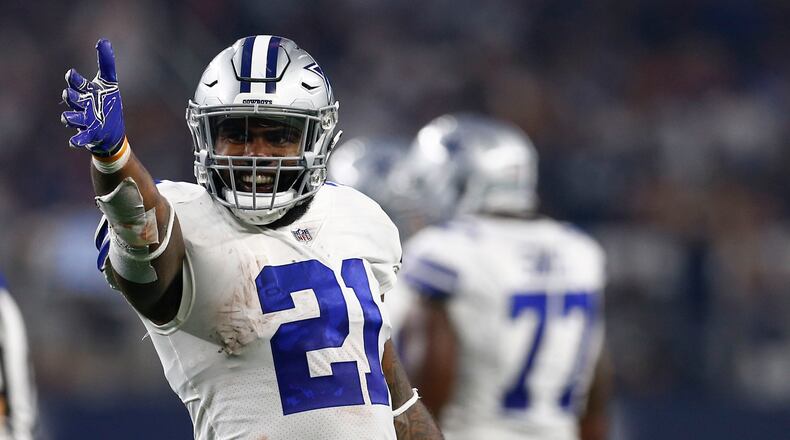 Dallas Cowboys running back Ezekiel Elliott celebrates a first down. Elliott ranks second in the NFL in rushing after nine games.