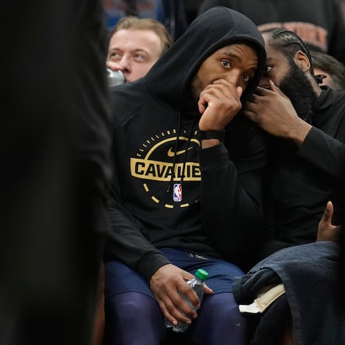 Cleveland Cavaliers guard Donovan Mitchell, left, talks with guard James Harden (1) during the second half of Game 4 in the Eastern Conference finals NBA basketball playoffs series against the New York Knicks in Cleveland, Monday, May 25, 2026. (AP Photo/Sue Ogrocki)