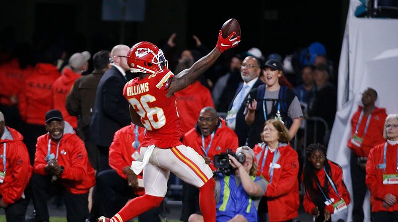 Kansas City Chiefs' Damien Williams (26) scores the final touchdown of Super Bowl 54 Sunday, Feb. 2, 2020, in Miami Gardens, Fla.