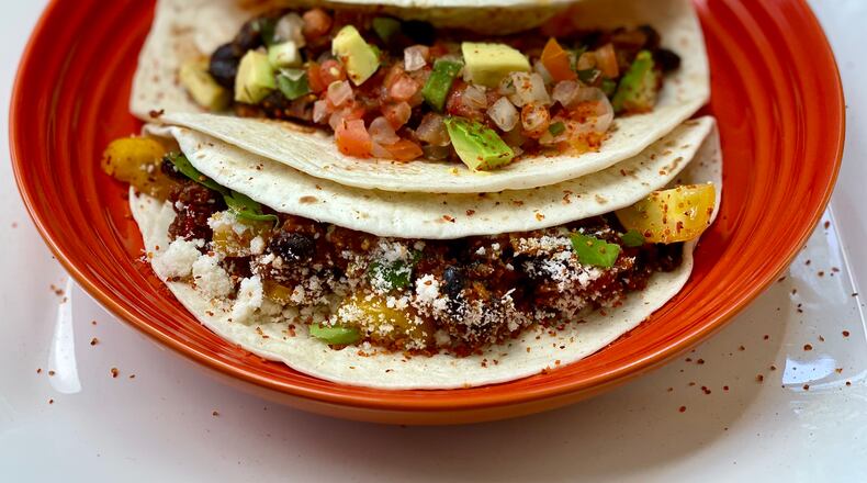 Use a plant-based protein to reduce the saturated fat in your favorite food. (Kellie Hynes for The Atlanta Journal-Constitution)