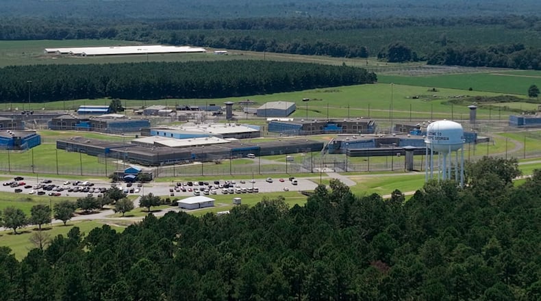 As the violence at Macon State Prison has intensified, so, too, have the calls for ambulance service. And because of those calls, the county now finds itself dealing with an unexpected and costly burden: more than $100,000 in unpaid bills. (Hyosub Shin / Hyosub.Shin@ajc.com)