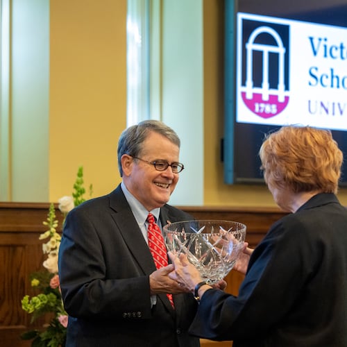 University of Georgia President Jere Morehead (left) honors Kay Ivester during an event Friday, April 17, 2026, where it was announced that UGA's new School of Nursing will be named after Ivester. (Courtesy of Dorothy Kozlowski/UGA)