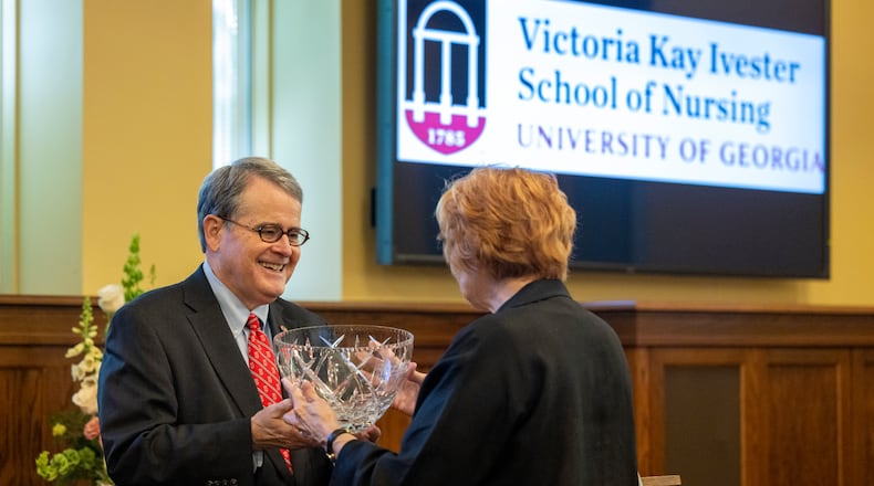 University of Georgia President Jere Morehead (left) honors Kay Ivester during an event Friday, April 17, 2026, where it was announced that UGA's new School of Nursing will be named after Ivester. (Courtesy of Dorothy Kozlowski/UGA)