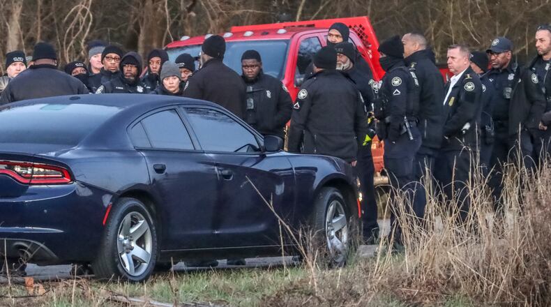 February 6, 2023 Atlanta Law enforcement was out en masse Monday morning, Feb. 6, 2023 at the site of Atlanta’s proposed public safety training center, clearing the woods in anticipation of construction on the controversial facility beginning in earnest. SWAT teams from the Atlanta, DeKalb County police departments, as well as Georgia State Patrol troopers and representatives from other agencies, were seen at the site in southwest DeKalb County. Construction contractors were also there with equipment. Amid the beeping of trucks backing up and the clanging of heavy equipment off Key Road, construction workers busily prepared the site with a backhoe and a bulldozer. Police officers in olive green uniforms patrolled the area atop all-terrain vehicles. The operation was taking place several days after officials announced that initial land disturbance permits had been approved for the $90-million facility — and about three weeks after a similar clearing operation resulted in the death of 26-year-old Manuel “Tortuguita” Teran. During that fatal Jan. 18 incident, Teran is accused of firing at troopers “without warning,” wounding one. Teran died after several other troopers returned fire, the Georgia Bureau of Investigation has said. (John Spink / John.Spink@ajc.com)