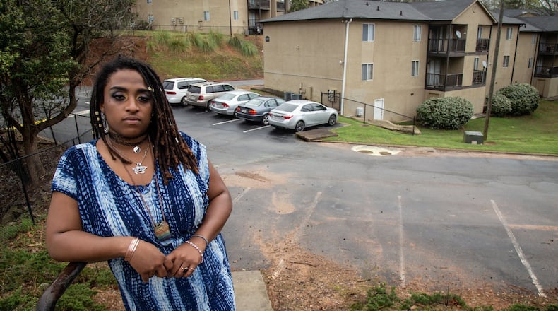 Jazmine White stands outside her Kingsley Village Apartments Saturday in Austell March 21, 2020. STEVE SCHAEFER / SPECIAL TO THE AJC