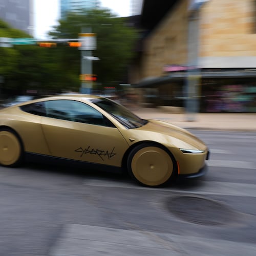 A Tesla Cybercab moves through downtown Austin, Texas, Thursday, Sept. 3, 2026. (AP Photo/Eric Gay)