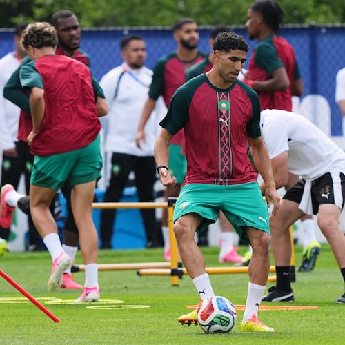 Morocco's Achraf Hakimi exercises during a training session ahead of the World Cup Group C soccer match between Scotland and Morocco in Foxborough, Mass., near Boston, Thursday, June 18, 2026. (AP Photo/Martin Meissner)