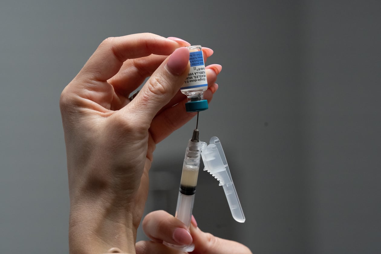 Lauren Ellenburg, a nurse, prepares a combination measles, mumps and rubella vaccine for a 12-month-old at Tiger Pediatrics in Easley, S.C., on March 17, 2026. (Mary Conlon/AP)