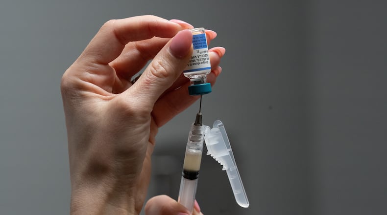 Lauren Ellenburg, a nurse, prepares a combination measles, mumps and rubella vaccine for a 12-month-old at Tiger Pediatrics in Easley, S.C., on March 17, 2026. (Mary Conlon/AP)