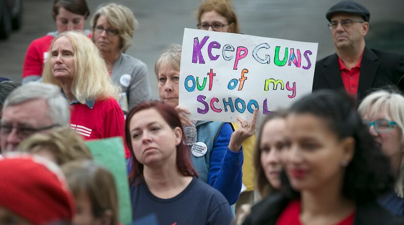 Women representing Moms Demand Action for Gun Sense in America gathered at the Capitol on Tuesday to voice their concerns with legislation from lawmakers allowing more freedom for gun advocates. RALPH BARRERA/AMERICAN-STATESMAN