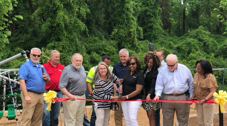 Smyrna has opened a new playground at Tolleson Park, 3590 King Springs Road, with state-of-the-art equipment for all ages. Mayor Max Bacon, Smyrna City Council members, Parks and Recreation staff and representatives from KOMPAN Inc. hosted a ribbon-cutting ceremony recently. (Courtesy of Smyrna)