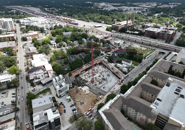 The footprint of a large new development in the Old Fourth Ward neighborhood is shown from above on Thursday, Sept. 8, 2022. Tree advocates say that often new developments fail to leave enough space for new tree plantings to grow and succeed. (Hyosub Shin/AJC)